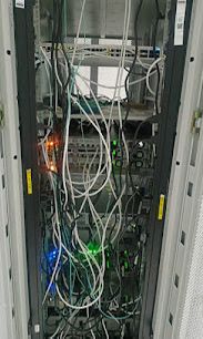 Live rack cabling and switching equipment inside a server cabinet